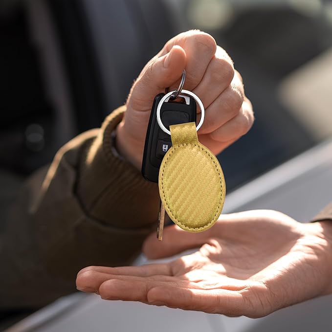 LaserGram Oval Keychain, Quad, Personalized Engraving Included (Carbon Fiber Gold)