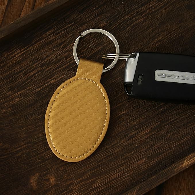LaserGram Oval Keychain, Quad, Personalized Engraving Included (Carbon Fiber Gold)